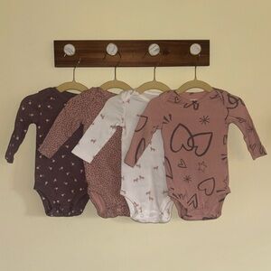 *NWOT* Carter’s baby girl 4-pack long sleeve bodysuit 6m